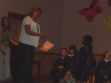 Kasen receiving her diploma